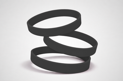 Zwarte, effen siliconen polsbandjes. Koop siliconen polsbandjes zonder opdruk bij JM Band®.