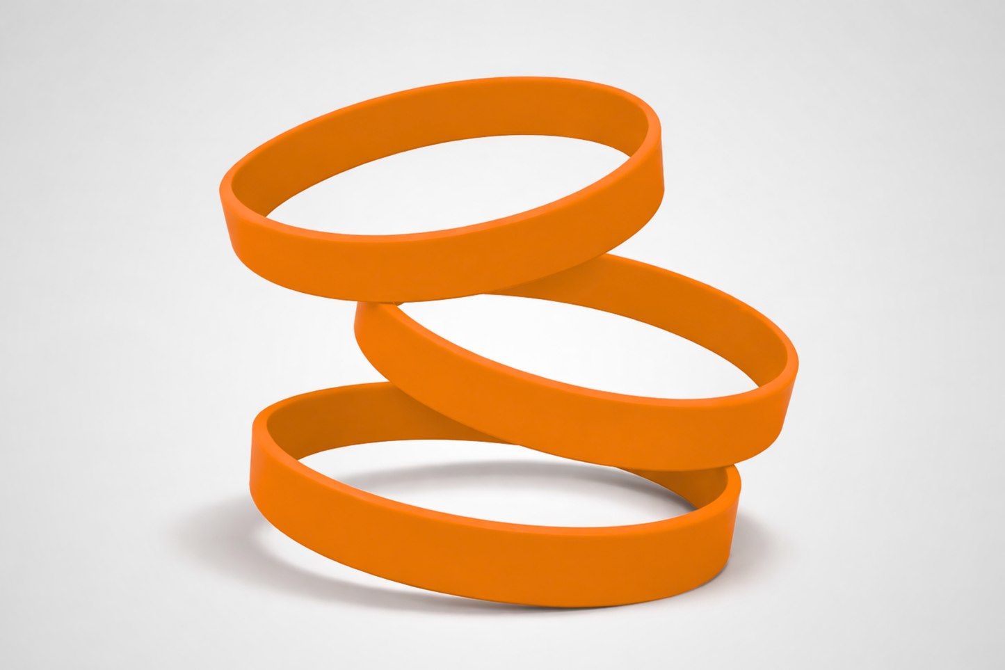 Oranje, effen siliconen polsbandjes. Koop siliconen polsbandjes zonder opdruk bij JM Band®.