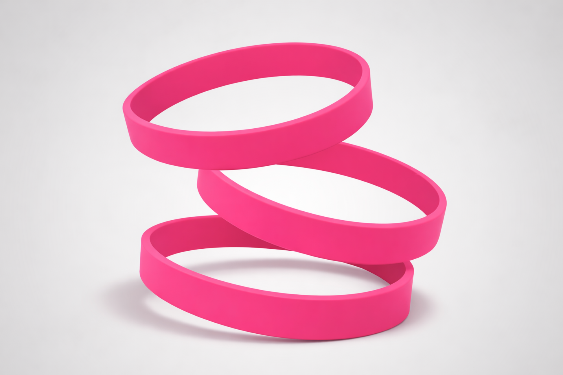 Roze, effen siliconen polsbandjes. Koop siliconen polsbandjes zonder opdruk bij JM Band®.