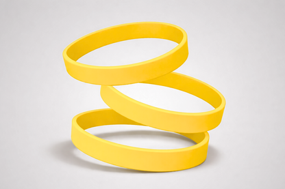 Gele, effen siliconen polsbandjes. Koop siliconen polsbandjes zonder opdruk bij JM Band®.