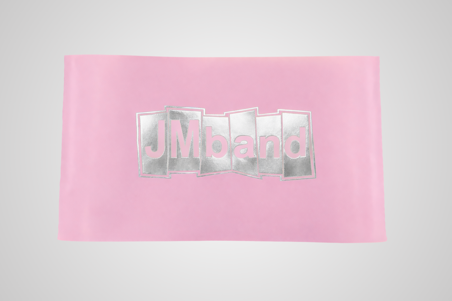 Een afbeelding van een roze lint met zilverkleurige thermische foliedruk van JM Band®.